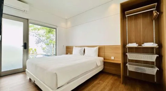 Suite con vista sulla piscina Bungalow Homes