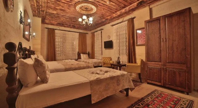Четырёхместный номер Standard Caravanserai Inn Hotel