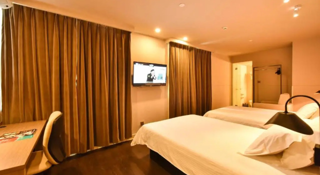 Jinjiang Inn Select Haikou Qilou Old Street Binhai Avenue, Book Hotel Billige hoteller i Haikou