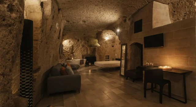 Deluxe quadruple chambre Aque cave