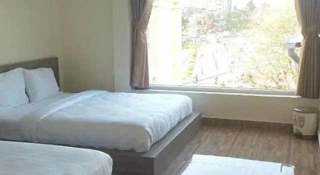 Четырёхместный номер Deluxe Nhật Nguyên Hotel
