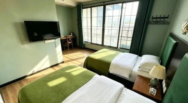 Семейный люкс с 3 комнатами Xingyi Yunshang Garden Homestay (Wanfenglin Xiangchou Market)
