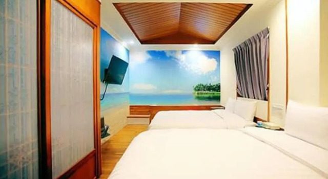 Standardowy rodzinny pokój Anshun Hotel