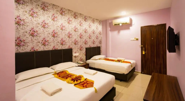 Номер Deluxe AB Inn Hotel