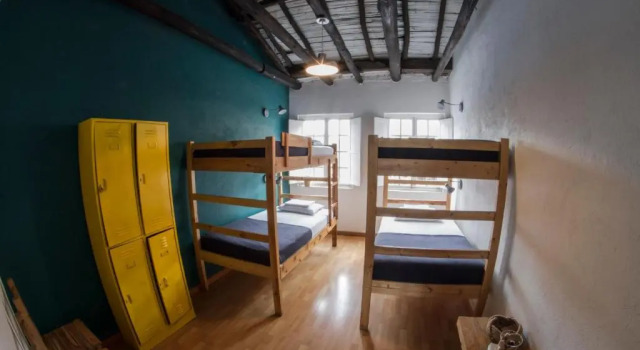 Кровать в общем номере Explora Hostels