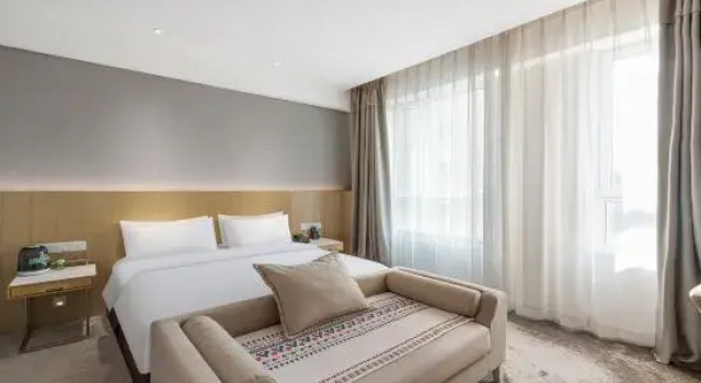 Двухместный люкс Qingdao Tired Bird Hotel