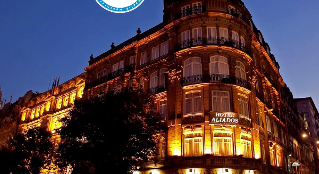 Кровать в общем номере Hotel Aliados