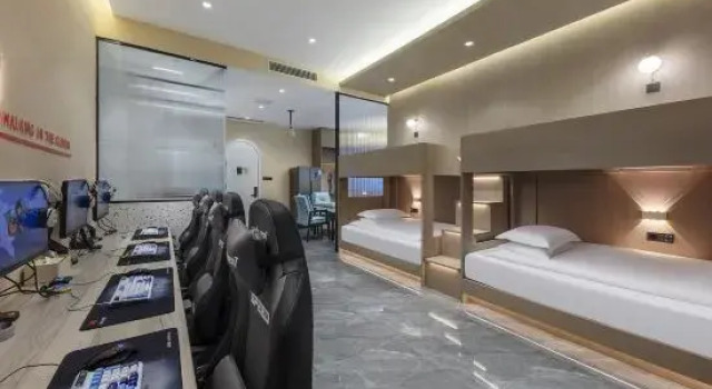Кровать в общем номере Manbuyunduan E-Sports Hotel (Zhongyuan Futa)
