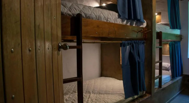 Cama en dormitorio compartido Cinnamon House