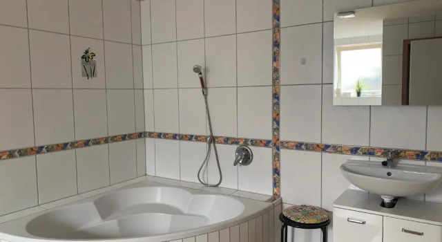 Апартаменты Ferienwohnung 1 Souterrainfenster
