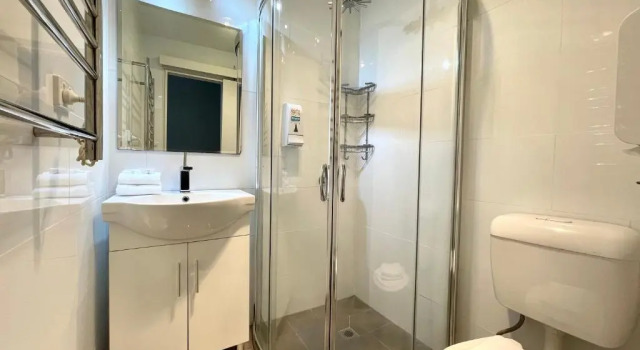 Кровать в общем номере Cooma High Country Motel