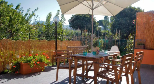 Апартаменты Appartamento con giardino Dolcemare
