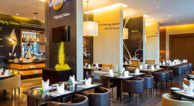 Отель Novotel Suites Mall Avenue Dubai