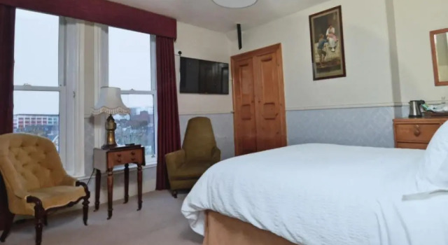 Standaard Tweepersoonskamer Raffles Guest Accomadation