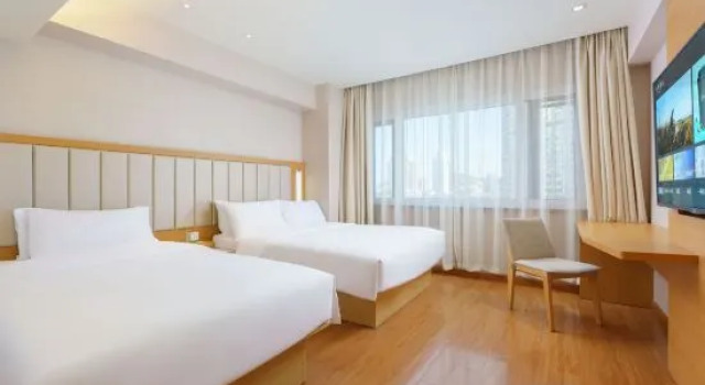 Номер Standard JI Hotel Dalian Qingniwa