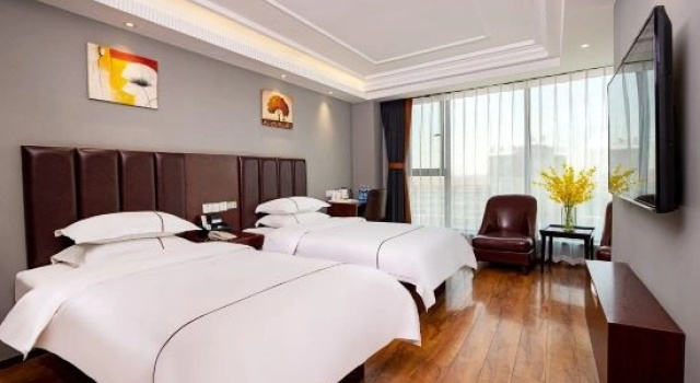 Люкс Business Kunlun Leju Business Hotel (Wenxian)