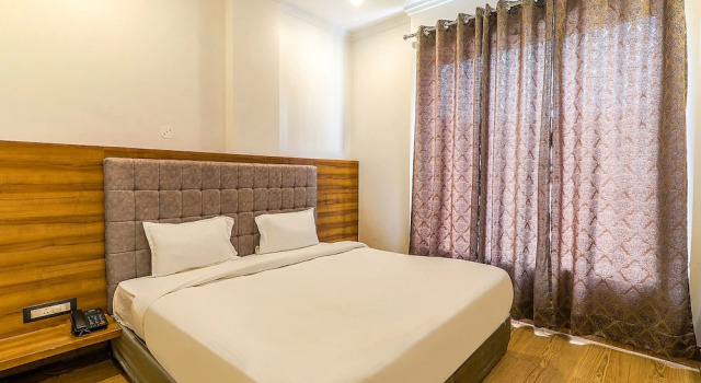 Номер Deluxe FabExpress Global Inn New