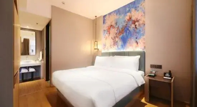 Люкс Deluxe Magnotel Business Hotel (Mudanjiang Railway Station Beian Road)