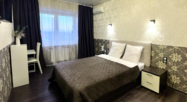 Cozy apartment with a large bedroom and a kitchen living room near the airport, Prenota Appartamento Hotel a Irkutsk Region con parcheggio, Parcheggio