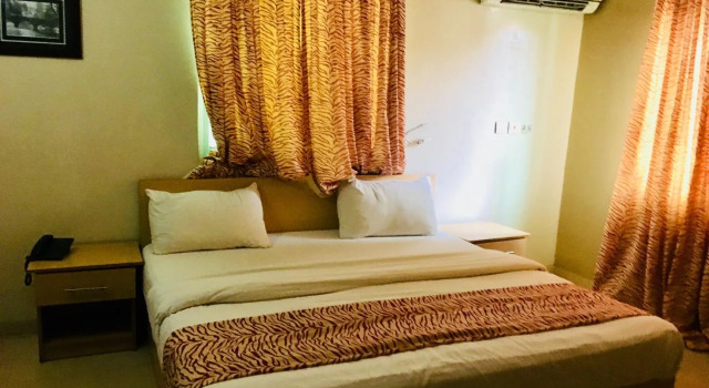 Mignonette Hotel & Suites, Buchen Sie Hotel Günstige Hotels in Ikpoba-Okha