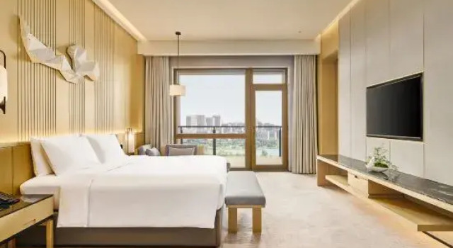Люкс Ambassador Secan Hotel Qingdao, Curio Collection By Hilton