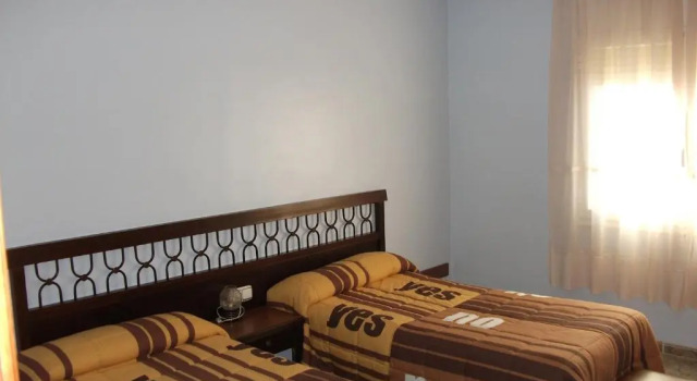 Standard triplă cameră Hostal Oasis