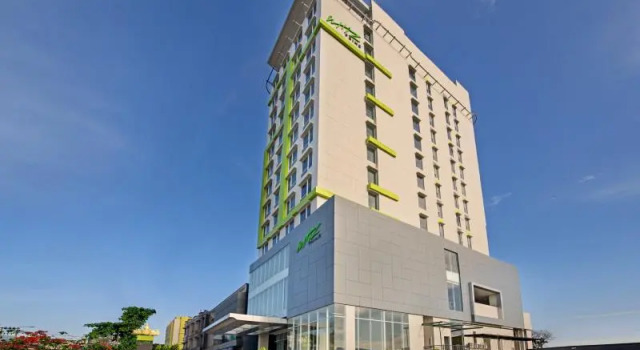 Кровать в общем номере Arte Hotel Bandar Lampung