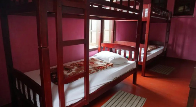 Кровать в общем номере The Mist Holiday Bungalow