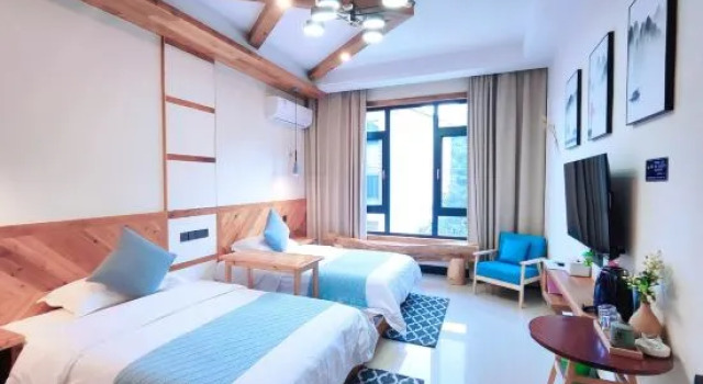 Кровать в общем номере Anji Guyun Homestay