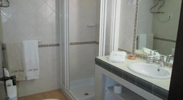 Люкс с видом на море Hostal Cala Moli