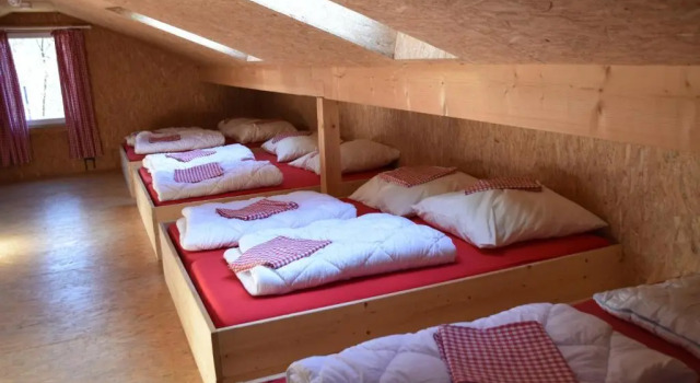 Кровать в общем номере Naturfreundehaus Veilbronn