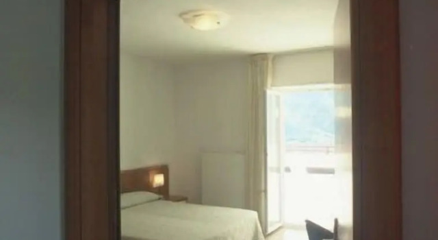 Четырёхместный номер Standard с балконом и с видом на горы Hotel Scaranò