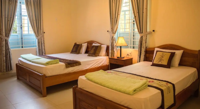 Четырёхместный номер Deluxe с видом на сад Areca Homestay