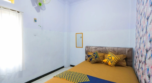 Ekonomiczny dwuosobowy pokój OYO 2497 Pesona Guest House