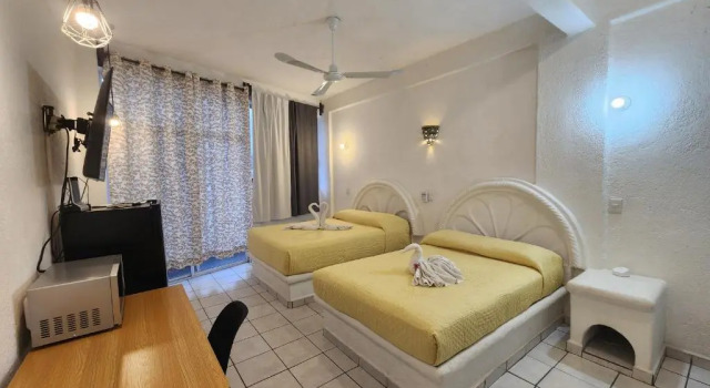 Lovely studio apartment with balcony AC & wi-fi, minutes from downtown!, Забронировать Апартаменты/квартира Сиуатанехо Ixtapa-Zihuatanejo
