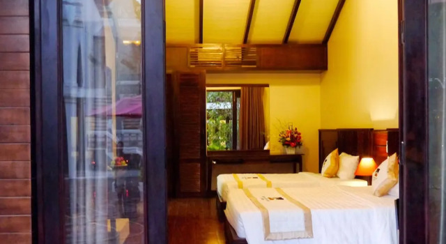 Кровать в общем номере Hoi An Retreat Phu Quoc