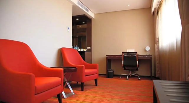 Номер Deluxe Tao Garden Hotel