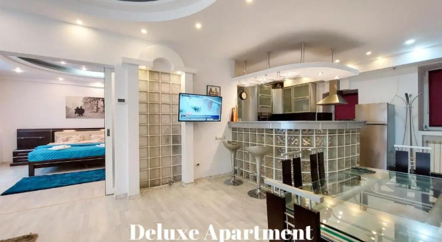 Апартаменты Deluxe Rosuites Apartment Accommodation