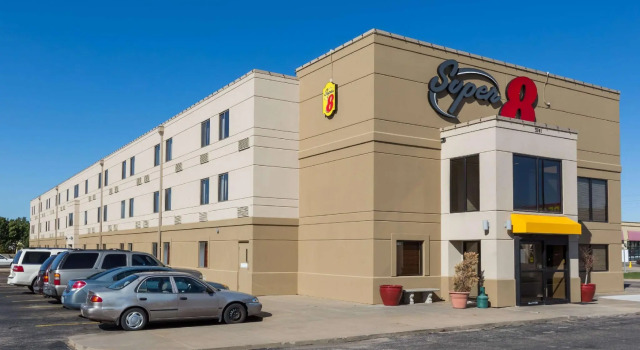 Кровать в общем номере Woodland Inn and Suites Extended Stay