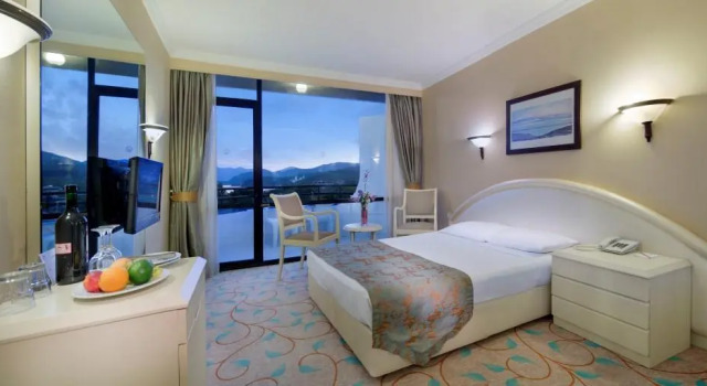 Кровать в общем номере Larissa Phaselis Princess Hotel - All Inclusive