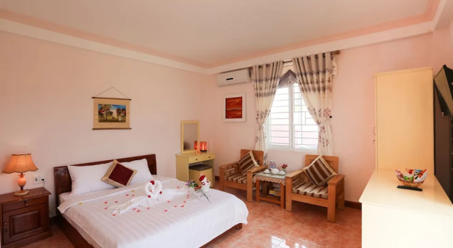 Люкс с балконом и с видом на реку Vy Hoa Hoi An Villas