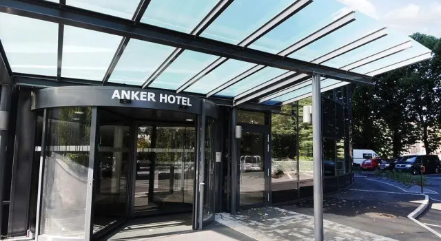 Кровать в общем номере Anker Hotel