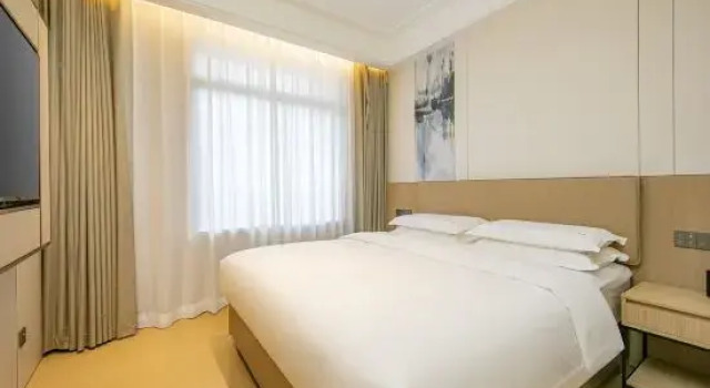 Семейный люкс Urba Hotel (Yantai Mountain Park Sancha Street Metro Station)