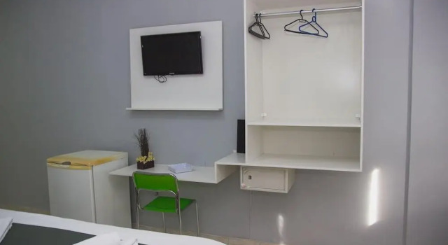 Кровать в общем номере Hotel FilipA©ia TambaAº