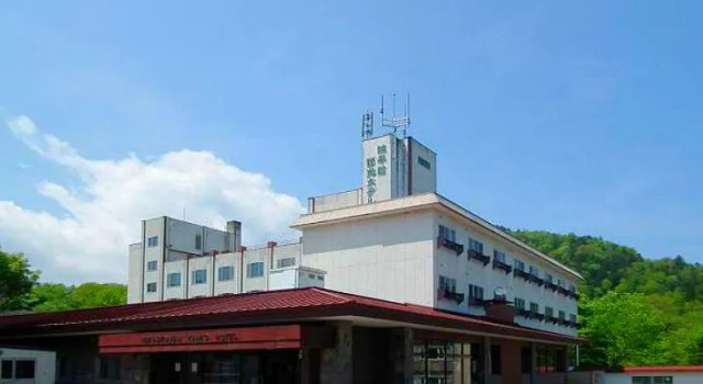 Кровать в общем номере Nukabirakan Kanko Hotel