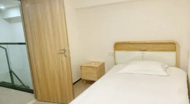 Трёхместный люкс с 2 комнатами Danzhou Mingyang Homestay