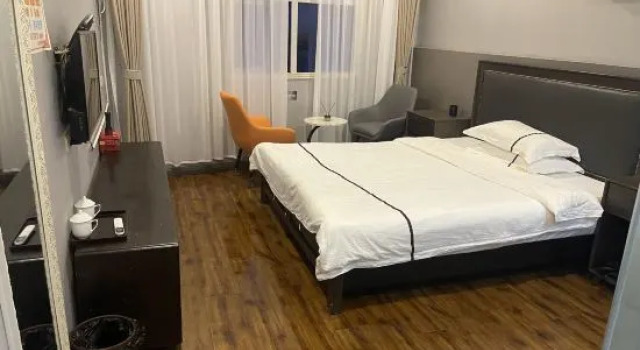 Номер Deluxe Mingdu Business Inn