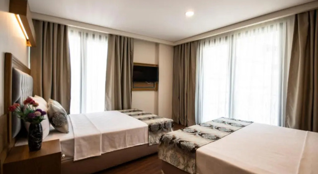 Трёхместный номер Eliza Hotel