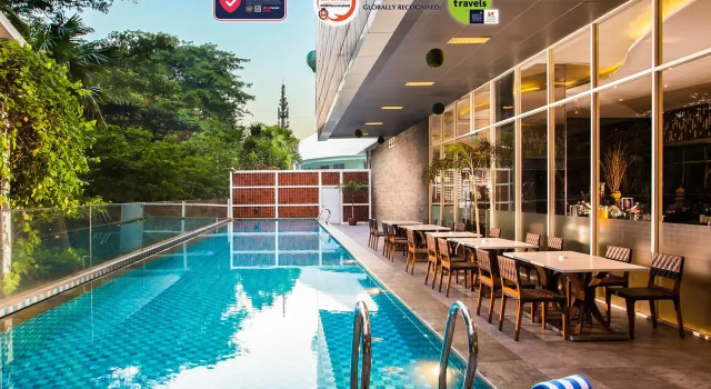 Кровать в общем номере Swiss-Belinn Kemayoran