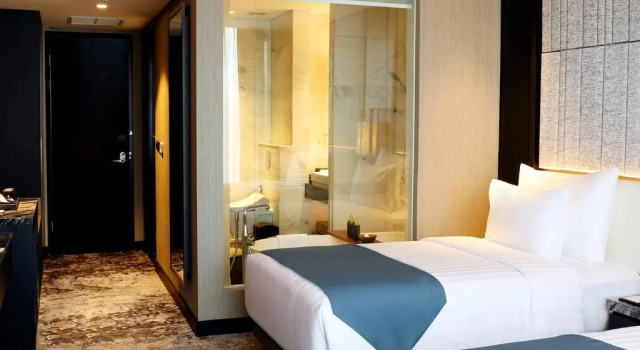 Premier double chambre JHL Solitaire Gading Serpong